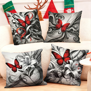 Des papillons rouges et des lys ornent des coussins décoratifs élégants noirs et blancs, ajoutant un charme festif au salon confortable. - Product Image 1
