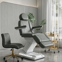 Table de massage électrique chauffante de luxe à 4 moteurs avec commande au pied pour salon de beauté moderne, spa, traitement cosmétique et salon de séjour