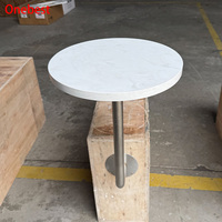 Table de buffet commerciale ronde de petite taille en faux pierre sur mesure, assemblée pour café et restaurant