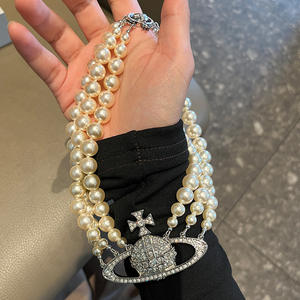 Collar de Clavícula Grande Exagerado Retro con Perlas de Saturno Chapado en Oro de Tres Capas, Joyería para Mujer, Estilo Empress Dowager - Product Image 1