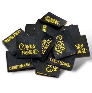 Custom Eco-Friendly Black Woven Clothing Garment Care Labels with One Side Fold and Press Labels for Shirt Jackets - Product Image 1