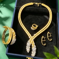 T436A Vente en gros d'usine, Nouveauté : Ensemble de bijoux exquis 4 pièces pour femme, motif fleur de lys africaine NAIJA, idéal pour mariage et rendez-vous, Dernière collection