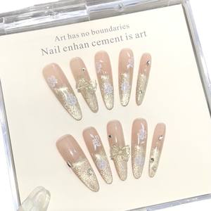 Ongles à presser de qualité supérieure, or pailleté ombré, nœuds translucides 3D et motifs floraux blancs, élégants ongles de mariée style féerique, vente en gros - Product Image 4