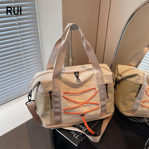 Sac de sport RUIQUWIN en tissu Oxford de haute qualité, léger, respirant, extensible, avec séparation sec/humide, durable, à porter en bandoulière - Product Image 1