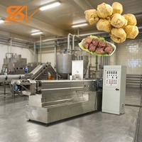 Machine d'extrusion pour la transformation des morceaux de soja et la fabrication d'aliments extrudés