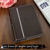 Nuevo y elegante cuaderno portátil creativo para estudiantes, de piel sintética PU A7, color marrón oscuro, con doble anilla y hojas sueltas.