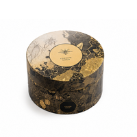 Emballage personnalisé en carton écologique rond pour les marques de miel avec motif abeille et logo personnalisé