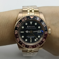 GMT Leuchtende Edelstahl-Zifferblattzeiger NH34 Uhrwerk Automatische Mechanische Premium-Uhr für Herren