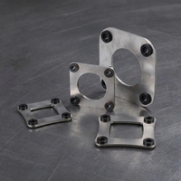 Connecteur d'arbre flexible à disque laminé en acier inoxydable 304 de forme carrée, fabrication OEM, garantie 3 ans