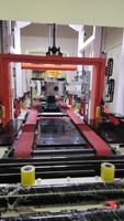 Machine de détection automatique en ligne de l'équilibre dynamique et de l'excès de dérive des moyeux de roues de camion