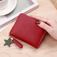 Porte-monnaie mini portable multifonction en cuir PU mignon avec pompon, protection RFID, style unisexe