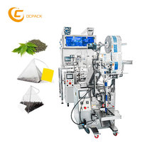 Machine d'emballage multifonctionnelle pour sachets de thé en forme de pyramides triangulaires en nylon, avec motif floral intérieur et feuilles de thé intérieures et extérieures