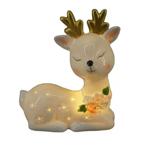 White handmade ceramic christmas lying down Sika deer with silver antlers foe led light Factory