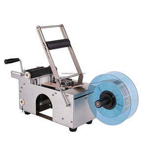 Machine d'étiquetage électrique FRP-MT50 pour petites bouteilles de vin, avec poignée adhésive manuelle et composant moteur pour emballages en verre - Product Image 1