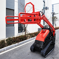 Mini-chargeuse compacte sur chenilles avec moteur Kubota et accessoires hydrauliques de préhension de balles pour l'agriculture et l'aménagement paysager