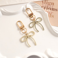 Accessoires de sac personnalisés : Pendentif pour sac et téléphone portable en alliage de zinc, style mode délicat avec strass et nœud