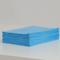 Paños de tela no tejida Spunlace de 10 mallas con orificios redondos, teñidos por completo, con código de color