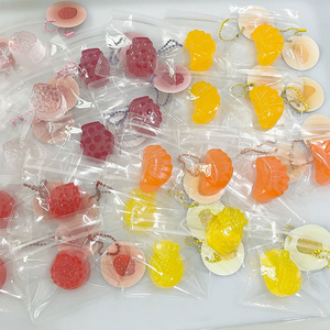 ของเล่นบีบลดความเครียดรูปผลไม้ขนาดเล็กน่ารัก ซีรีส์ Kawaii Mini Fruit Segments เหมาะสำหรับเป็นของขวัญสำหรับเด็กและผู้ใหญ่ ขายส่งพวงกุญแจแบบถุงบีบขนาดเล็ก - Product Image 1