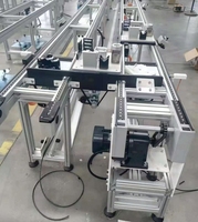 Transportador de Palets de Aluminio de Doble Velocidad con Banda de Acero Inoxidable, Velocidad Ajustable Ascendente y Descendente, Línea de Ensamblaje en Bucle