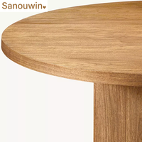 Ensemble de table à manger ronde en chêne massif de luxe avec chaises en tissu confortables et durables et dossier solide pour l'ameublement de la maison