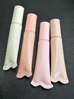Tête en silicone souple emballage de baume à lèvres en plastique cosmétique bouche vide tube rouge extrudé brillant à lèvres tube d'huile conteneur