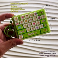 Meilleures ventes transfrontalières : Porte-clés clavier mécanique anti-stress à grille 26 touches, motif dessin animé, jouet délicat en plastique