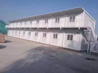 Qingdao LANJING 20ft Acier Intégré Logement Bonne Qualité Travailleur Extensible Pack Plat Conteneur Maison à Prix Compétitif