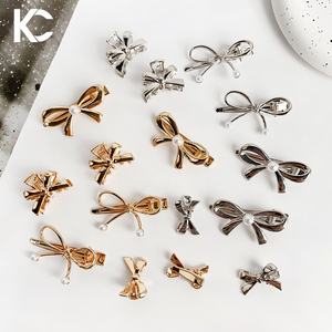 KUACHI venta al por mayor elegante lazo pinza de pelo de alta calidad oro arco perla Metal pinzas de pelo personalizado mujeres pinzas de pelo con logotipo - Product Image 1