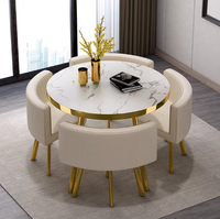 Table à manger ronde de luxe très vendue avec chaises en métal et plateau en MDF pour salon, café, hôtel, cantine, salon de thé