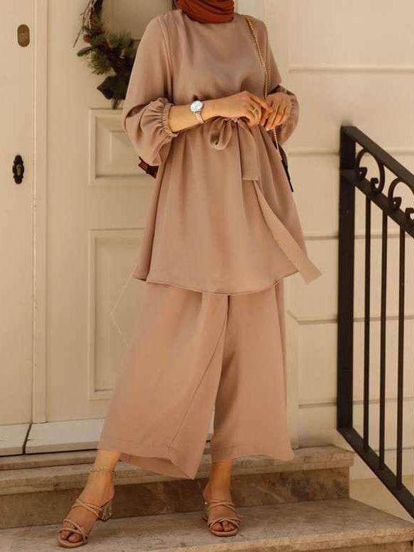 Caqui (sin pañuelo en la cabeza)