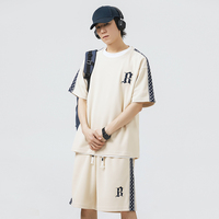 Streetwear personnalisé 2 pièces unisexe hommes été jogger ensemble survêtements gaufré hommes t-shirt short ensemble