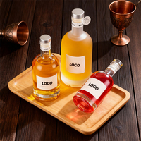 Vente en gros 100ml 10cl Brandy Mini Gin Vodka Liqueur Spiritueux Bouteilles en verre de luxe avec bouchons