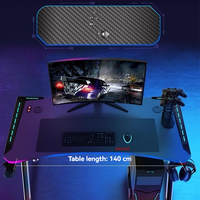 Table de jeu ergonomique 2026 à succès – Mobilier de salle de jeux – Bureau d'ordinateur de jeu en forme de Z avec support pour téléphone