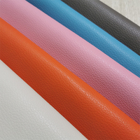Tissu en cuir PU gaufré litchi couleur unie pastel clair avec support tissé résistant à l'abrasion pour sièges de voiture, canapés et sacs - 0,7-0,8 mm