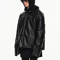 Veste en cuir PU noire cirée vintage pour homme, style streetwear, coupe oversize, avec coutures contrastées et fentes apparentes