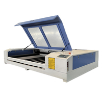 El diseño compacto de Julong ocupa un espacio mínimo de escritorio mini 1390 1610 máquina de grabado de corte láser CO2 para tela acrílica de madera