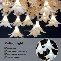 Lustre LEDA personnalisé à 10 têtes en forme de fleurs de citrouille, suspension de plafond en plastique avec fleurs de lys pour décoration de plafond de mariage