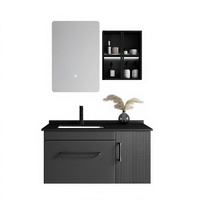 Meuble-lavabo de salle de bain moderne noir mat flottant à cannelures avec miroir rétroéclairé par LED, armoire latérale et porte cannelée, lavabo intégré