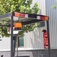 Nouveau chariot élévateur électrique à quatre roues avec batterie au plomb-acide, cabine, déplaceur latéral hydraulique, pneus pleins pour utilisation en intérieur/extérieur