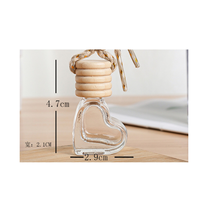 Vente chaude 6ml Diffuseur de parfum de voiture en forme de coeur Bouteille de parfum de voiture suspendue en verre clair vide