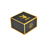 Boîte cadeau rigide pliable en carton noir avec logo personnalisé, laminage mat, fermeture magnétique et insert en mousse