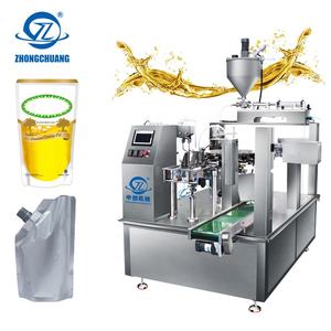 Machine d'emballage pour huile de cuisson comestible (palme, olive, tournesol) en sachet Doypack, avec fonction de remplissage et de scellage, et pour l'emballage de lubrifiant moteur en sachet. - Product Image 1