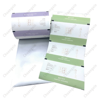 Rollo de película de embalaje automático Flexible laminado de papel de grado alimenticio arcoíris con impresión de gradiente personalizada de fábrica