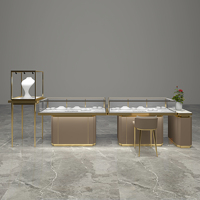 Vitrine à bijoux personnalisable en acier inoxydable et verre trempé pour magasin, service complet exclusif fournisseur
