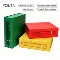 Boîte cadeau rigide pliable ODM avec poignée portable, logo personnalisé en relief pour souvenir d'entreprise, emballage cadeau de luxe