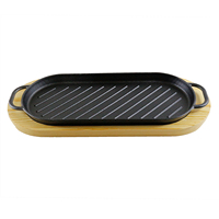 Poêle à griller ovale en fonte pré-assaisonnée durable avec plateau en pin, idéale pour griller et servir