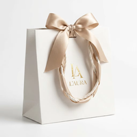 Sac de shopping en papier personnalisé avec logo imprimé, recyclable, avec poignée en ruban et nœud, pour les magasins de vêtements, de bijoux et de chaussures