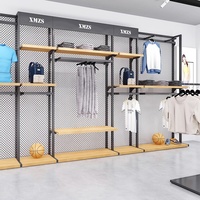 Usine personnalisé métal et bois présentoir est pour les vêtements de sport balles chaussures sacs vêtements vêtement Boutique affichage