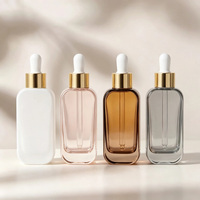 Flacon compte-gouttes en verre transparent de 50 ml à épaule plate avec logo personnalisé pour huile capillaire, sérum, gouttes pour les yeux, sérum de soin de la peau, emballage cosmétique