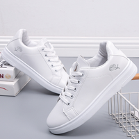 Vente en gros baskets blanches supportées OEM et ODM chaussures de skate basses à la mode pour femmes chaussures de campus pour filles